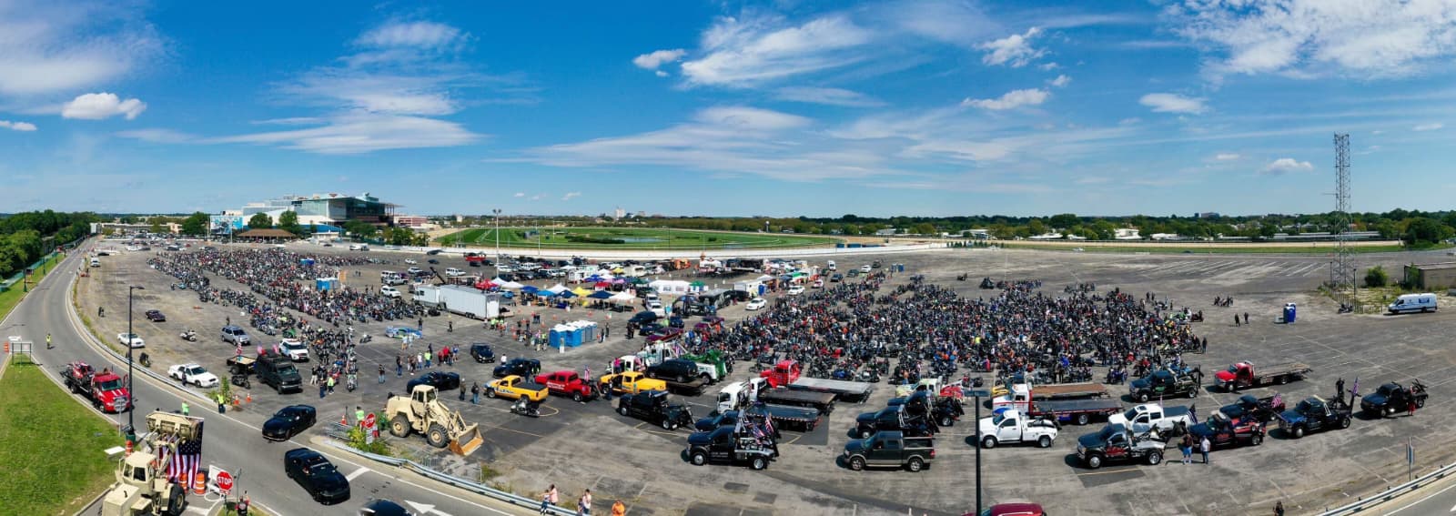 The staging lot at Aqueduct Racetrack filled with motorcycles before kickstands up