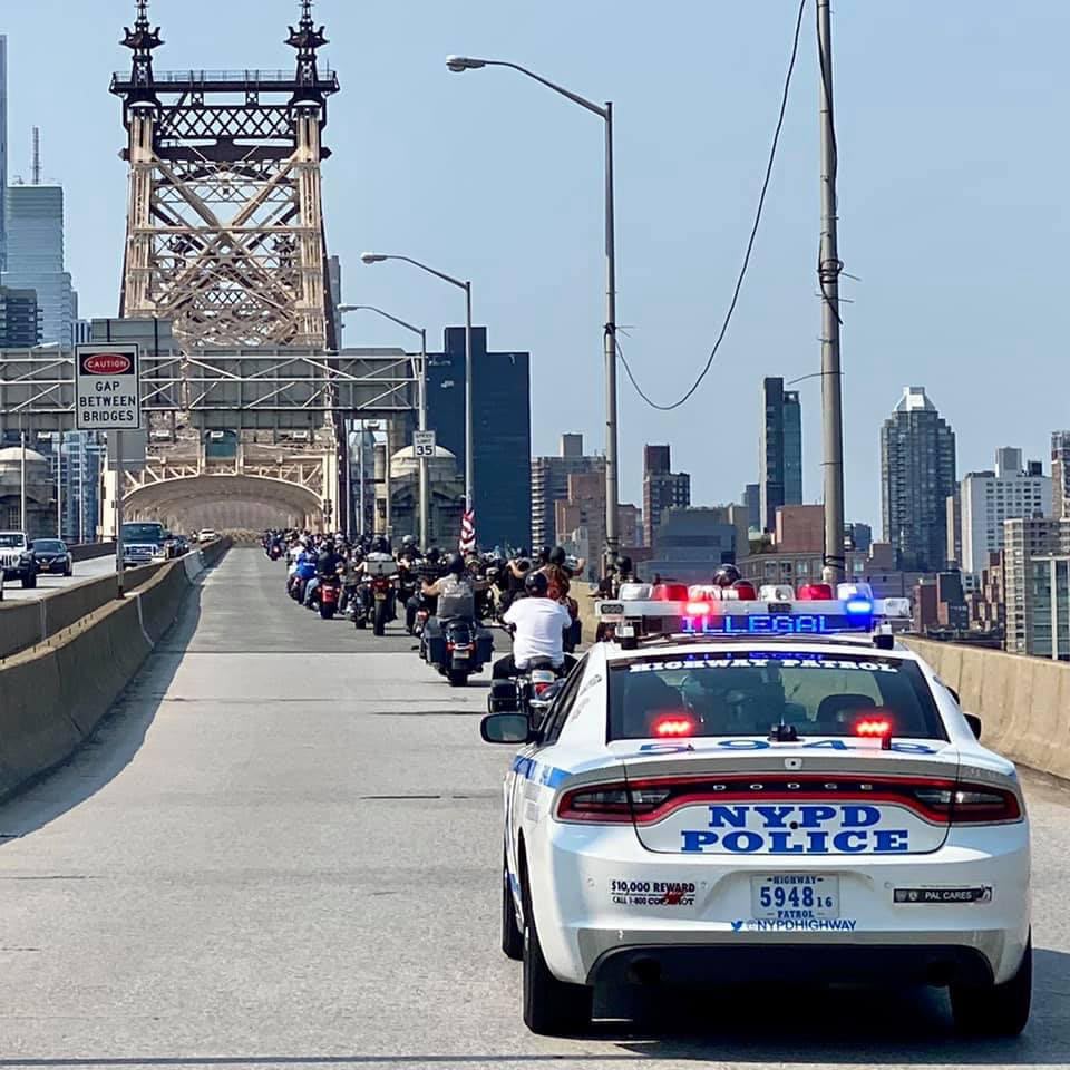 Riders crossing the Queensboro Bridge with an NYPD Highway Patrol escort during a previous 9/11 Memorial Ride